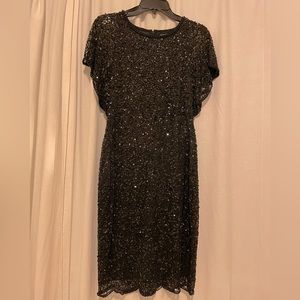 Only worn once designer black Sequins and beads lace evening dress size 4